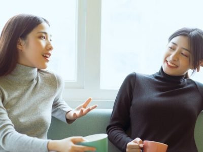 two-asian-women-chatting-by-window_296537-2811.jpg