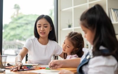 beautiful-asian-female-teacher-babysitter-is-teaching-art-young-kids-home_67155-37793